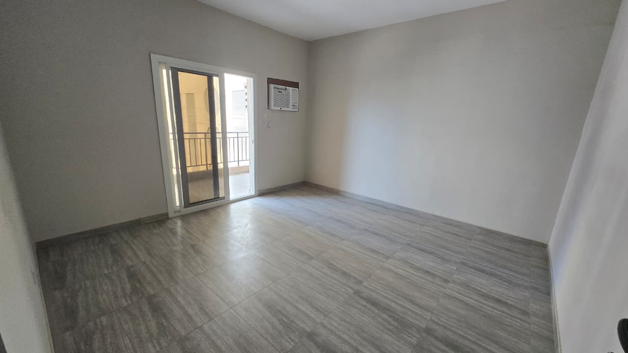 2BR apartment with two living areas and balcony in Al Majaz 2, near Dubai exit and services. Flexible payment via Tabby or Tamara.