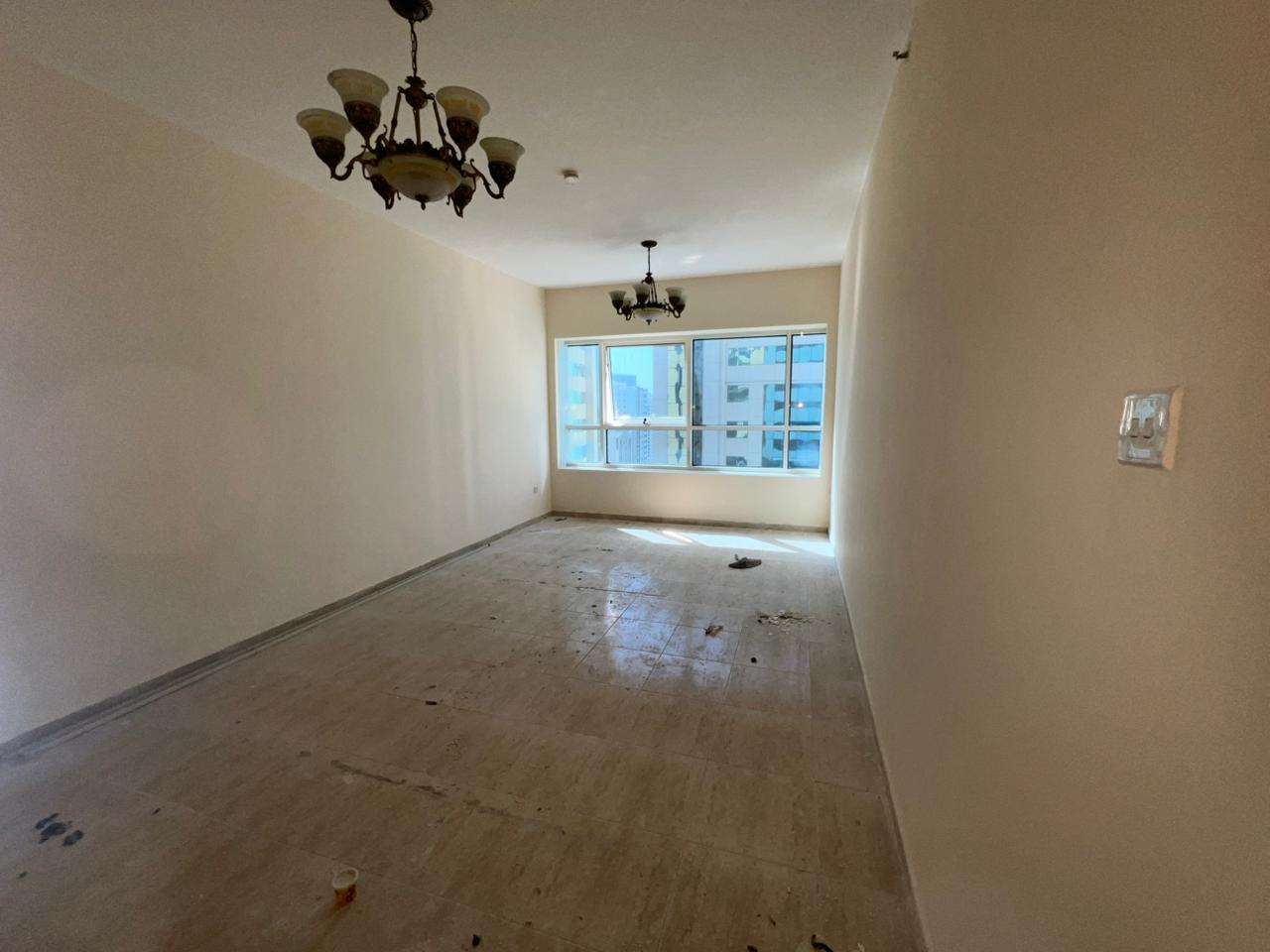 1BR apartment in Al Taawun with free AC, gym, pool & parking, near Oriana Hospital and malls, easy payment via Tabby & Tamara