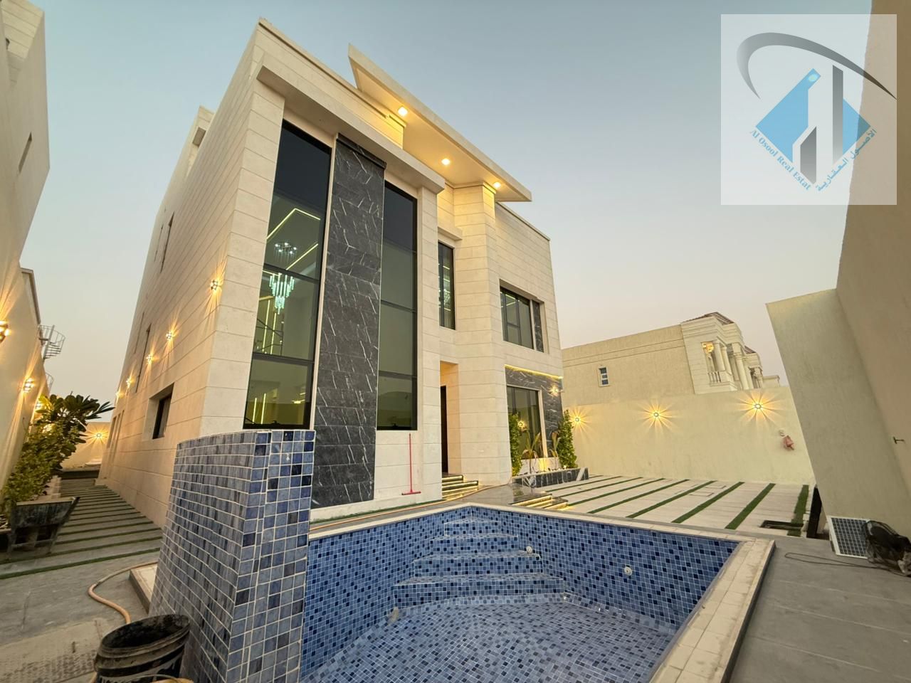 Villa with all registration, ownership, electricity, and water fees included, located on the main street, ready to move in, in one of Ajman's most pre