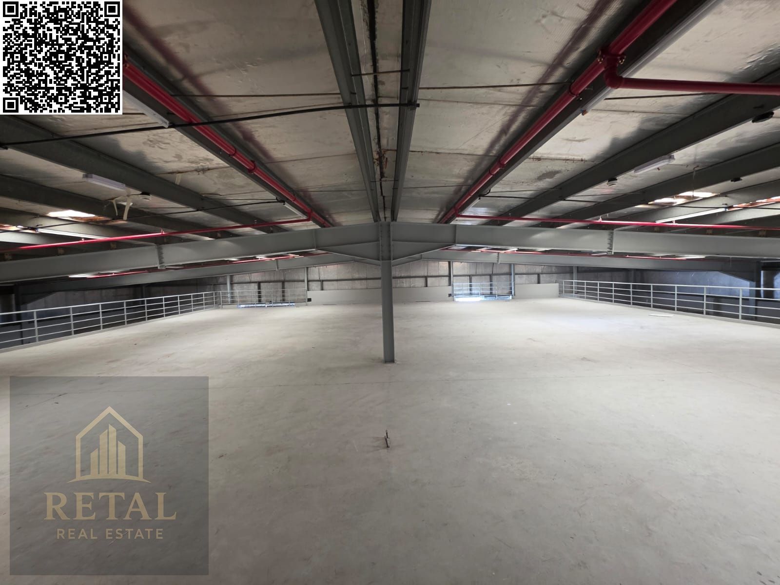 Large warehouse on the main street, with a large open space in front, suitable for all activities.