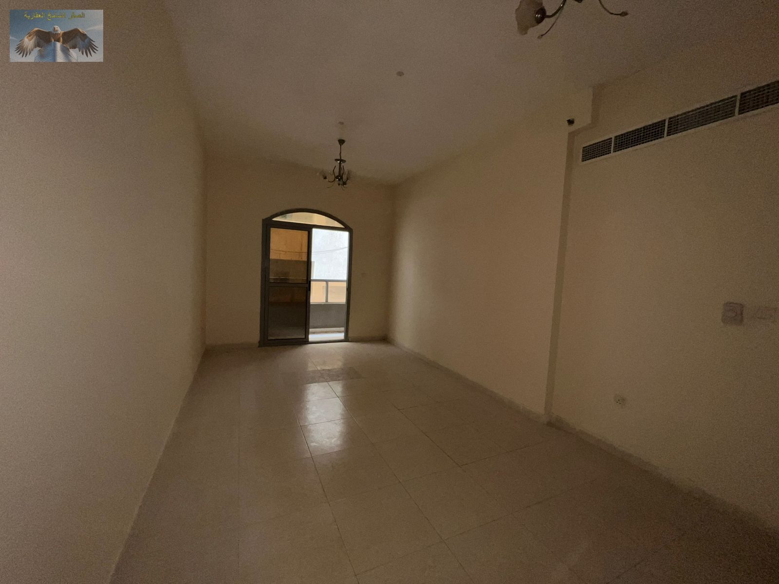 A beautiful 1-bedroom apartment with a living hall, equipped with central air conditioning and a balcony, featuring high-quality finishes. Located in
