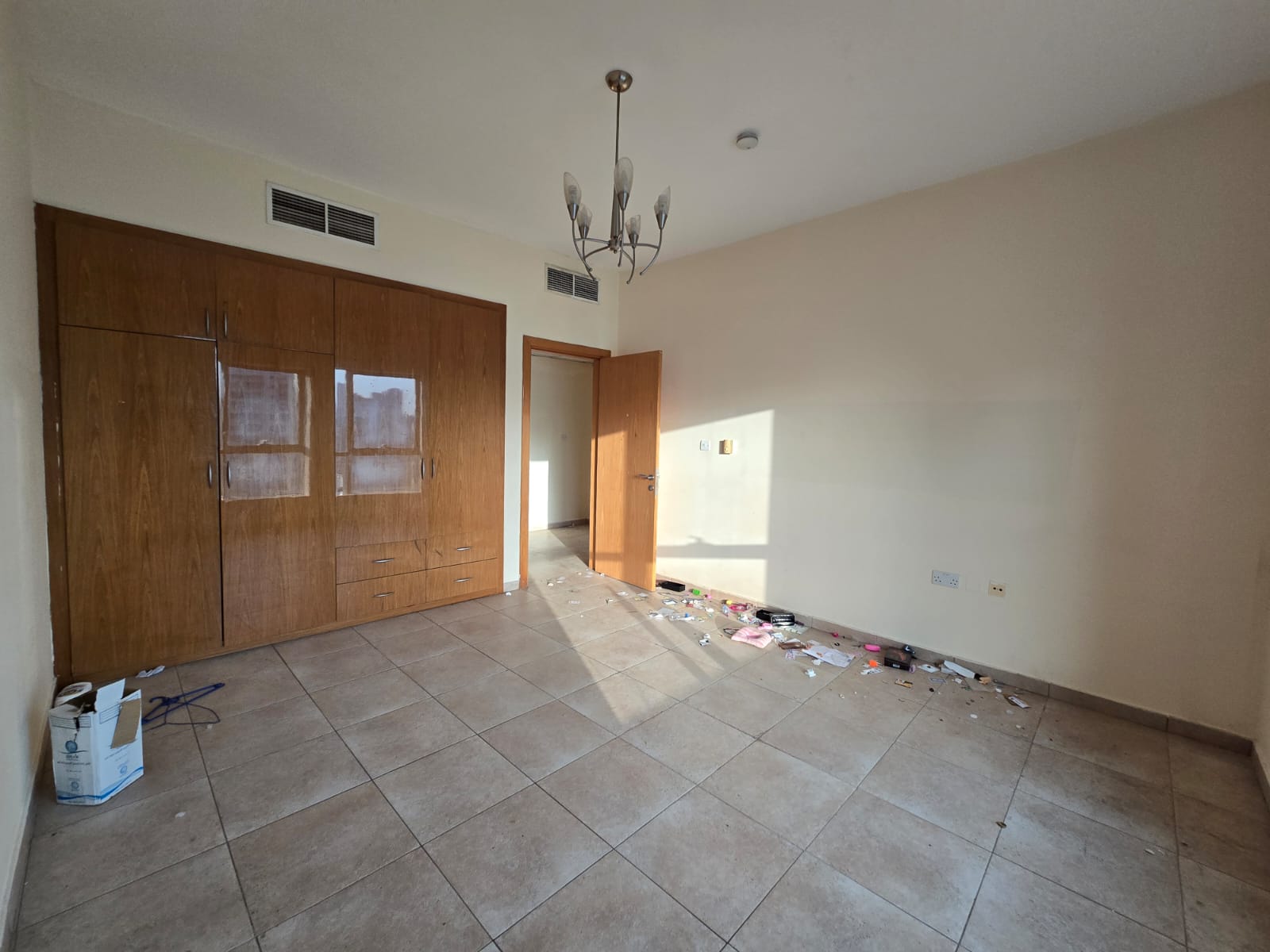 Two bedroom apartment for rent in Al Majaz 2 with free AC, open sea view, prime location near Dubai exit and services.