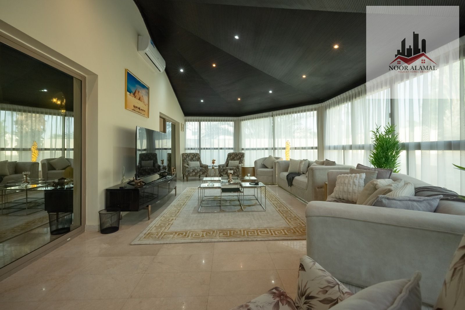 Sharjah, Sharqan, villa with 3 bedrooms, 2 large reception areas, 3 bathrooms, and a garden.