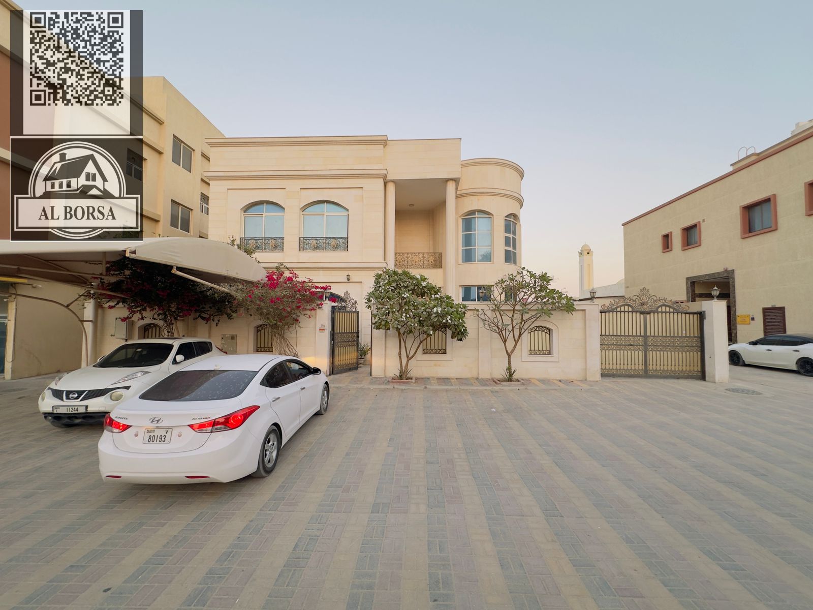 For rent in Rawda 1, a furnished villa with 5 master bedrooms, a majlis, two living rooms, a spacious kitchen, and a maid's room.