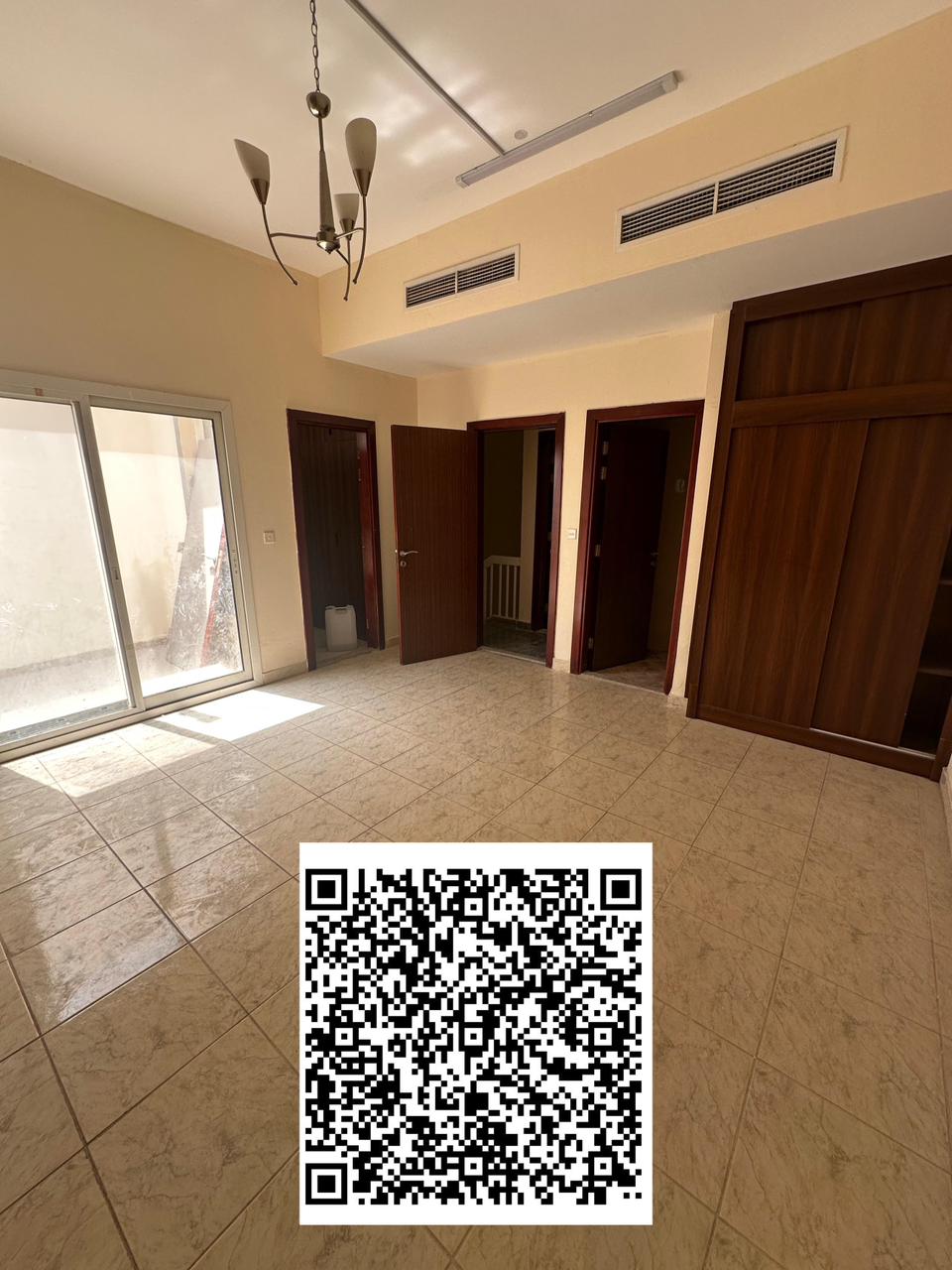 Elegant Three-Bedroom Townhouse with Three Bathrooms for Sale in a Prime Residential Community