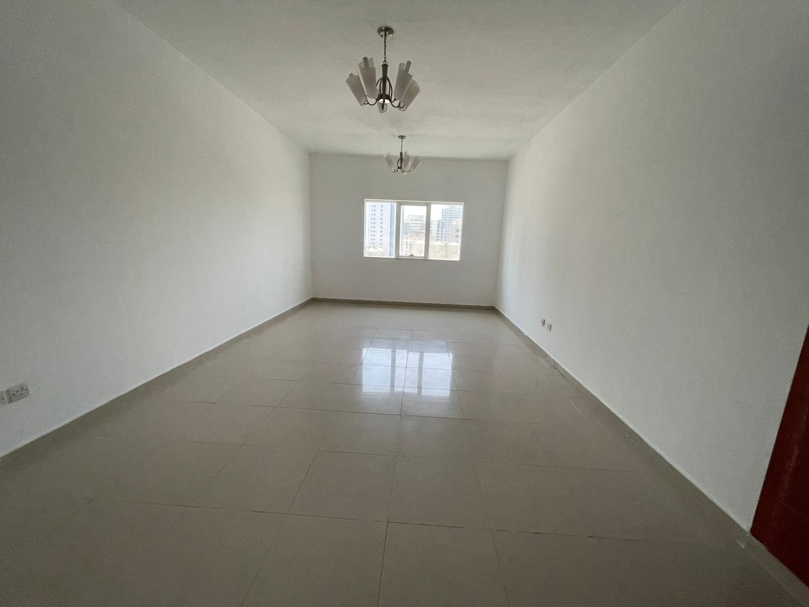 Free parking – The largest 2-bedroom apartment with a living room in Al Taawun, featuring a balcony with an open view and a store room.