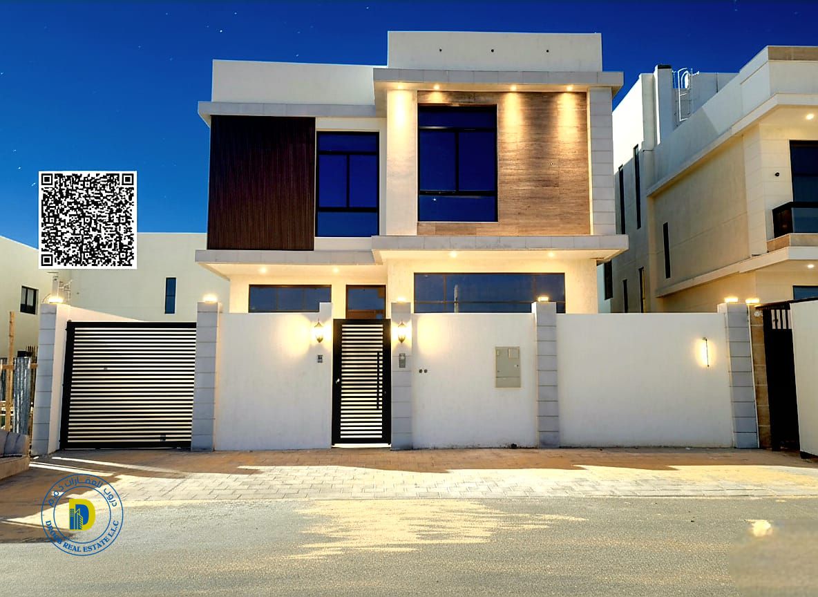 For sale in Al Zahiyah, luxurious modern villa with 5 bedrooms and roof. Super deluxe finishing. Bank financing . Freehold for all nationalities.