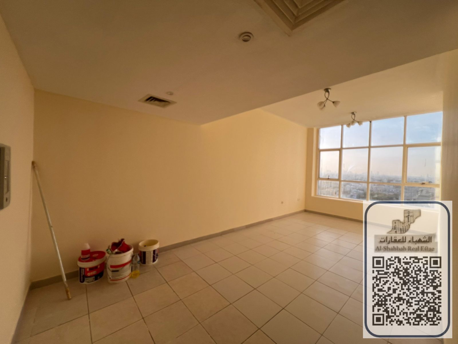 Own a two-bedroom apartment with a beautiful view of a main street.