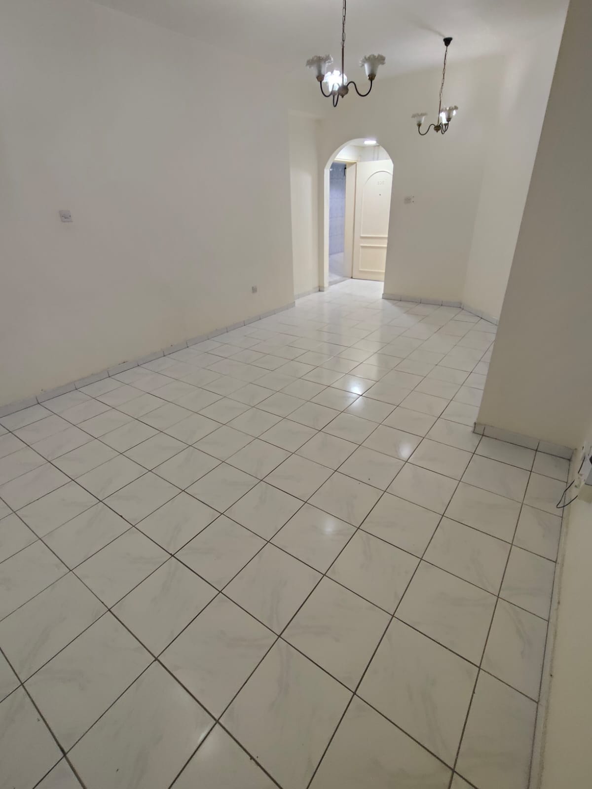 Two rooms and a living room, 2 bathrooms. Al-Khan Ali on the main road.