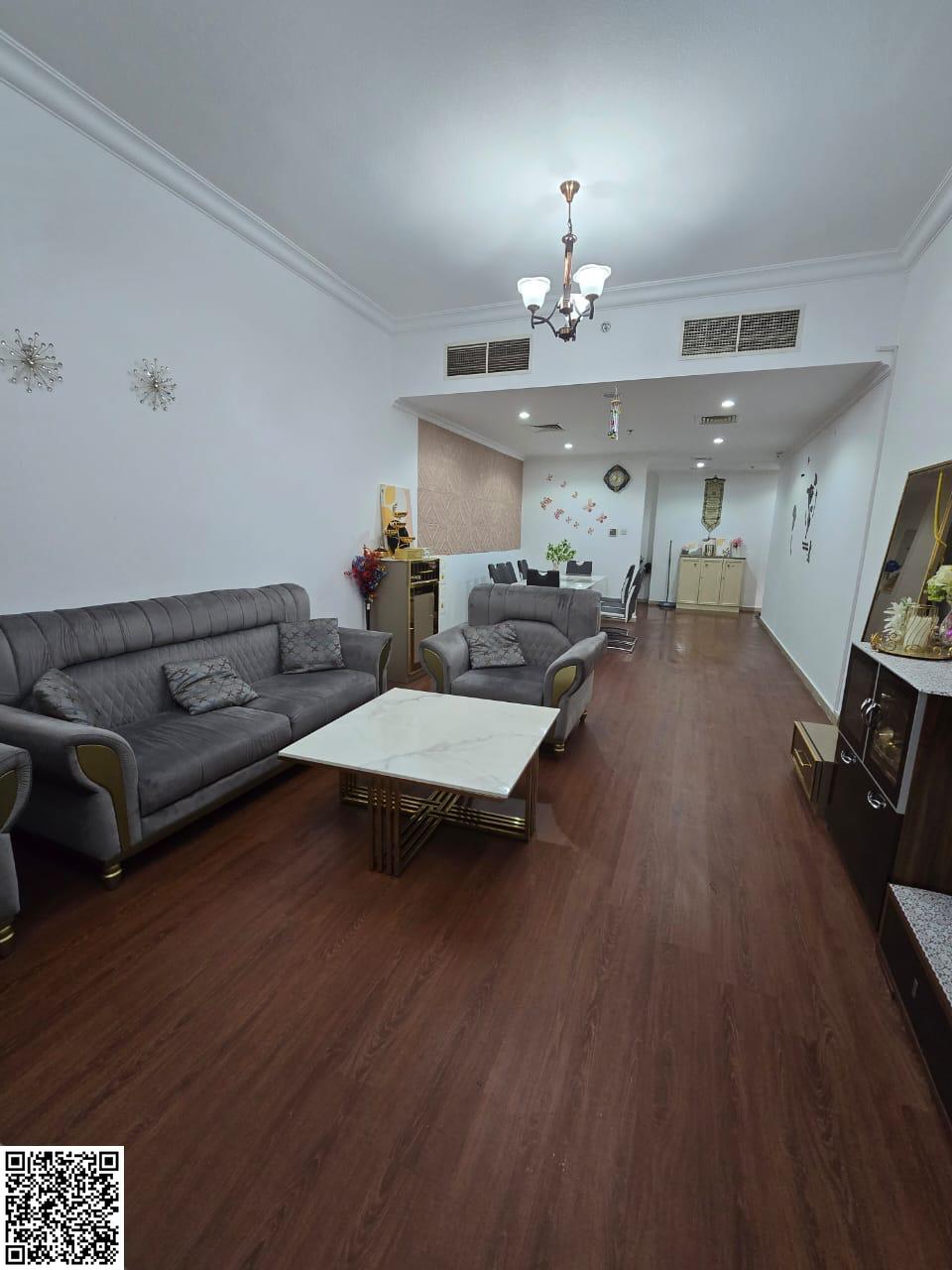 Two bedrooms and a large living room, furnished, in the Concorde Towers on Khalifa Street next to Gallery Mall