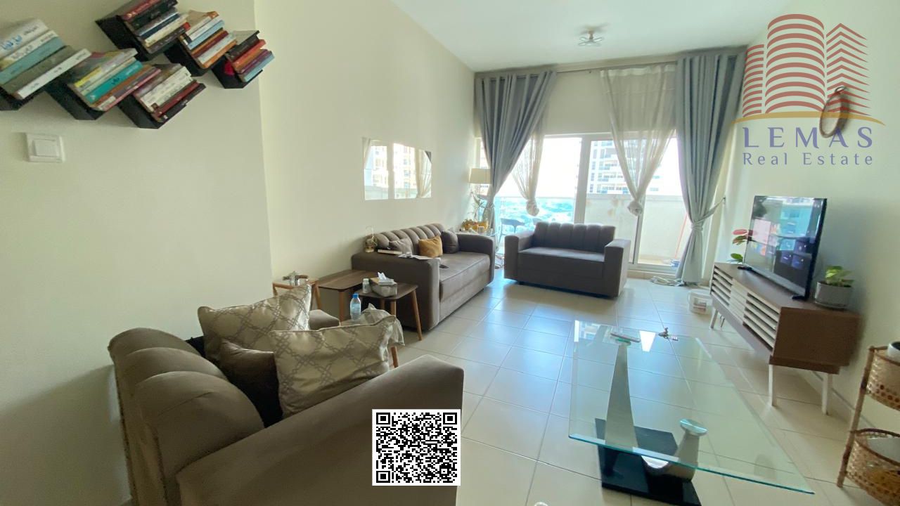 Two bedrooms, living room, closed kitchen, garden view