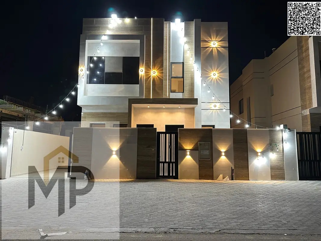 A luxurious modern two-story villa, including registration and ownership fees, luxury finishes, and freehold ownership for all nationalities.