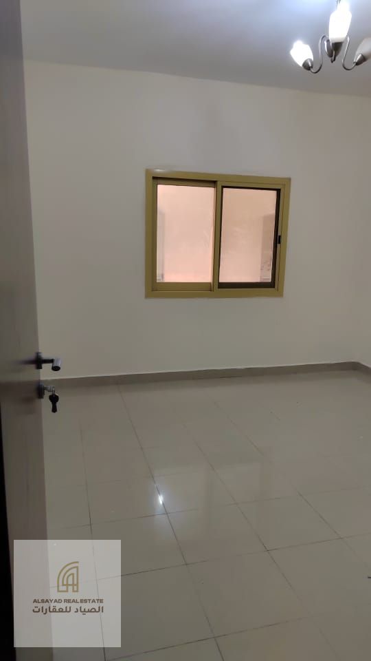 Two bedrooms and a living room for sale in Al Qasimia, Sharjah, with parking.