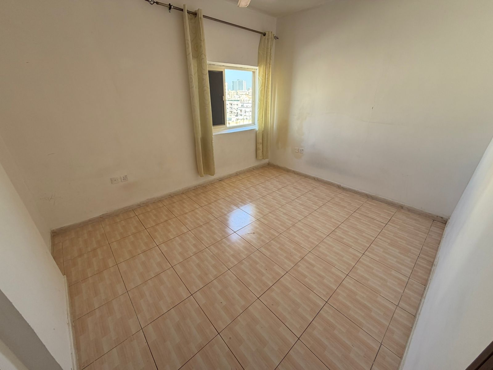 Beautiful One-Bedroom Apartment with Central Air Conditioning – Second Row on Ajman Corniche at a Special Price