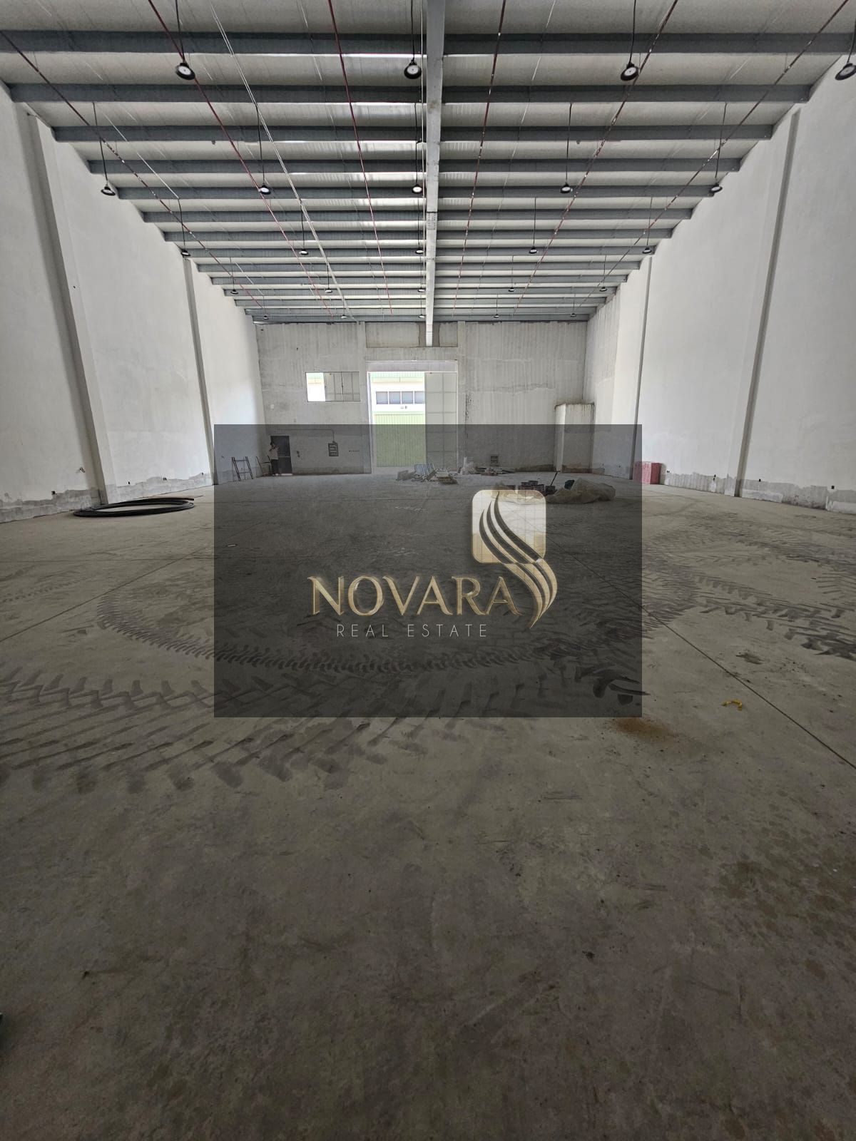 Warehouse for rent in Al Jurf Industrial Area 3 on a main street with an area of 5500 feet, 50 kW electricity, ideal location for business at a380k