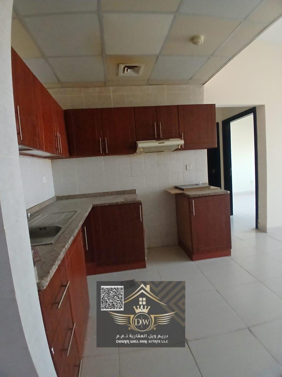 2 Bedroom Apartment with Parking and Open Kitchen Available For Rent in Paradise Lake Tower Emirates City, Ajman