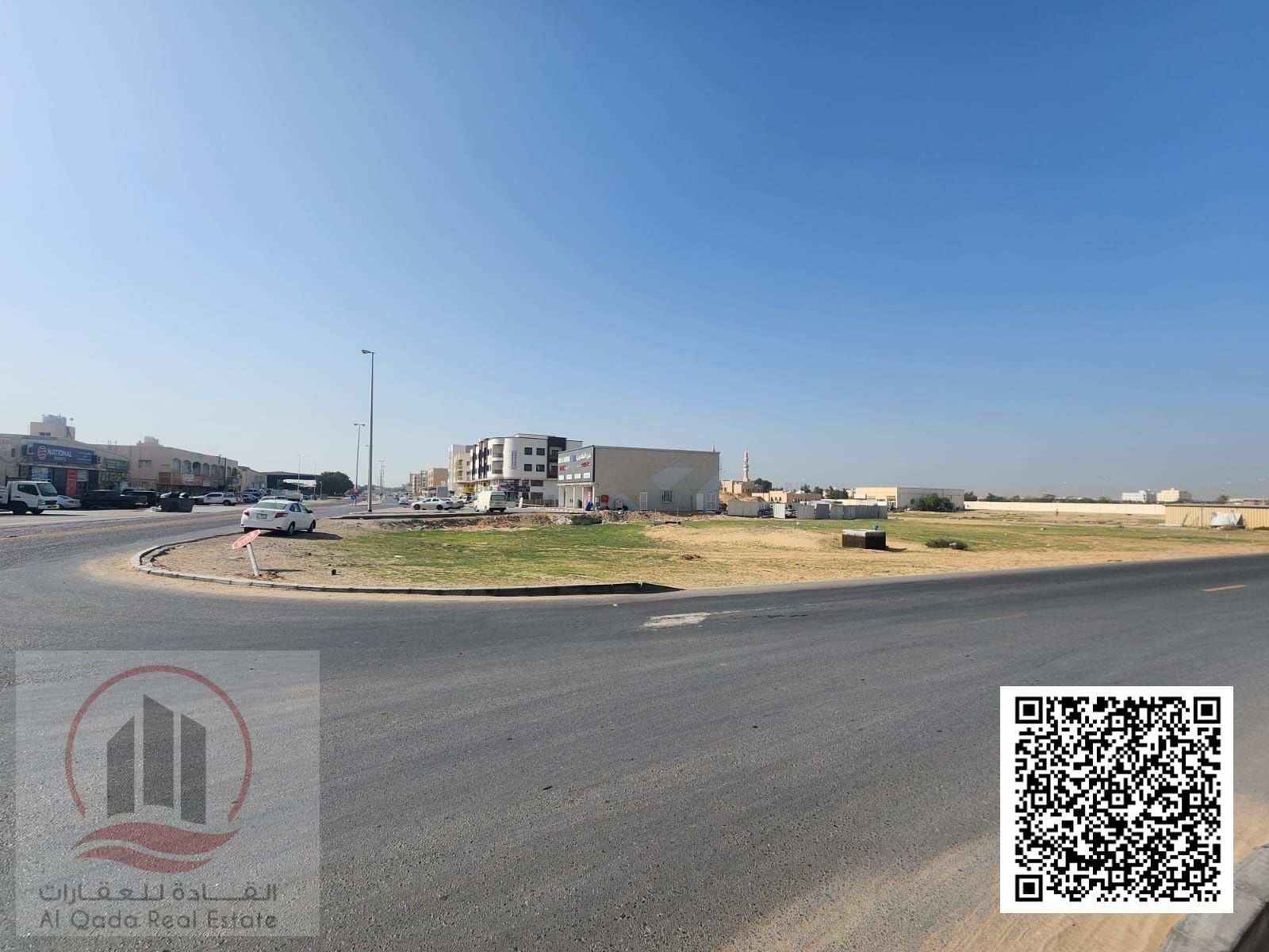 Corner land on a main street for sale in Al Jurf Industrial City 2, land area 10,000 feet, land located on 3 streets, land neighbor, permit G+5