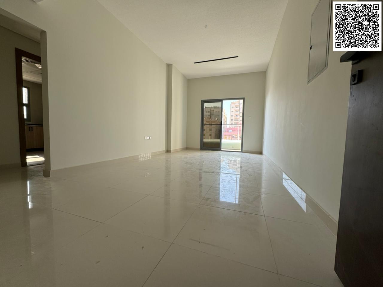 New building, first tenant, for annual rent in Al Nuaimiya 1. Luxury 3BR hall apartment, wardrobes, open-view balcony, family area.