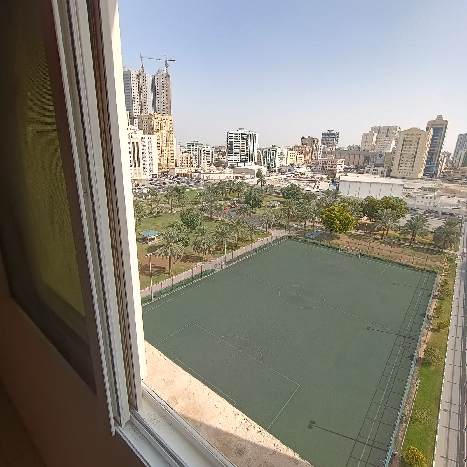 View of Al Mahatta Park, balcony, two bathrooms, spacious layout, and an excellent lively location.