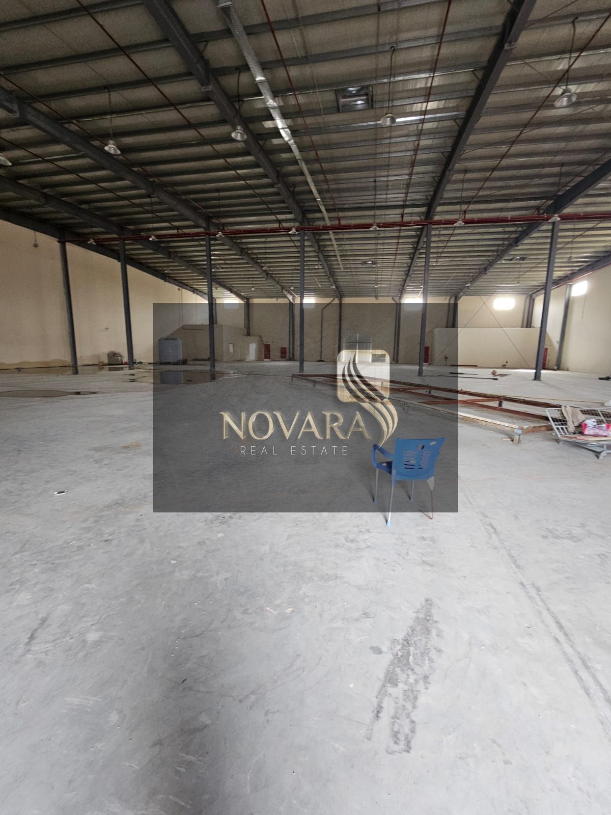 A new warehouse for rent in Umm Al Quwain with an area of 45,500 feet, consisting of two adjacent warehouses, 12-room workers' accommodation, and 71