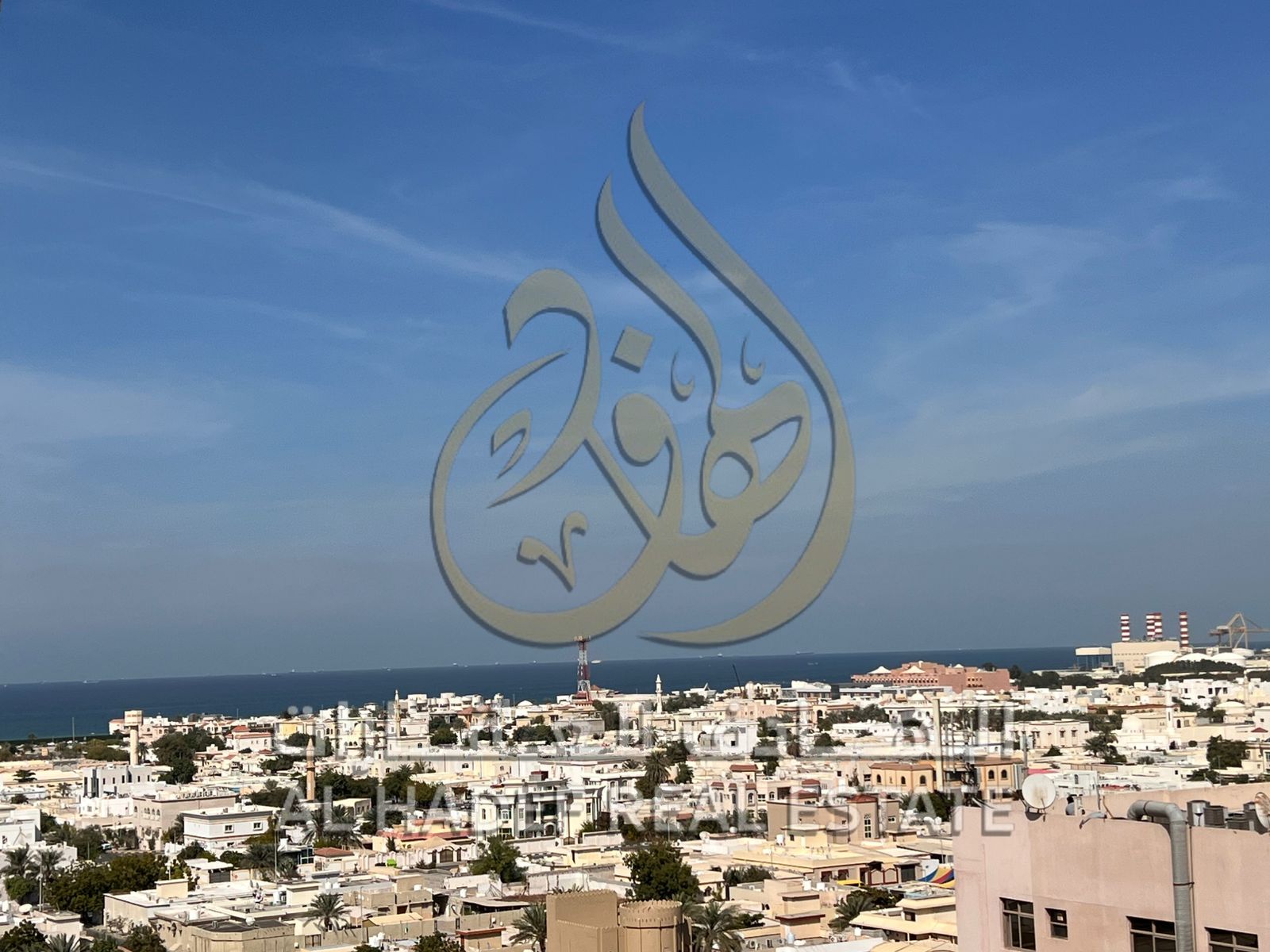 Prime Residence in Al Majaz 3 - Strategic Location & Free Parking