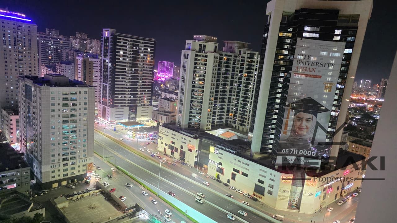 I live in the heart of Ajman in a fully furnished one-bedroom apartment with a living room, and the garage is in City Tower.