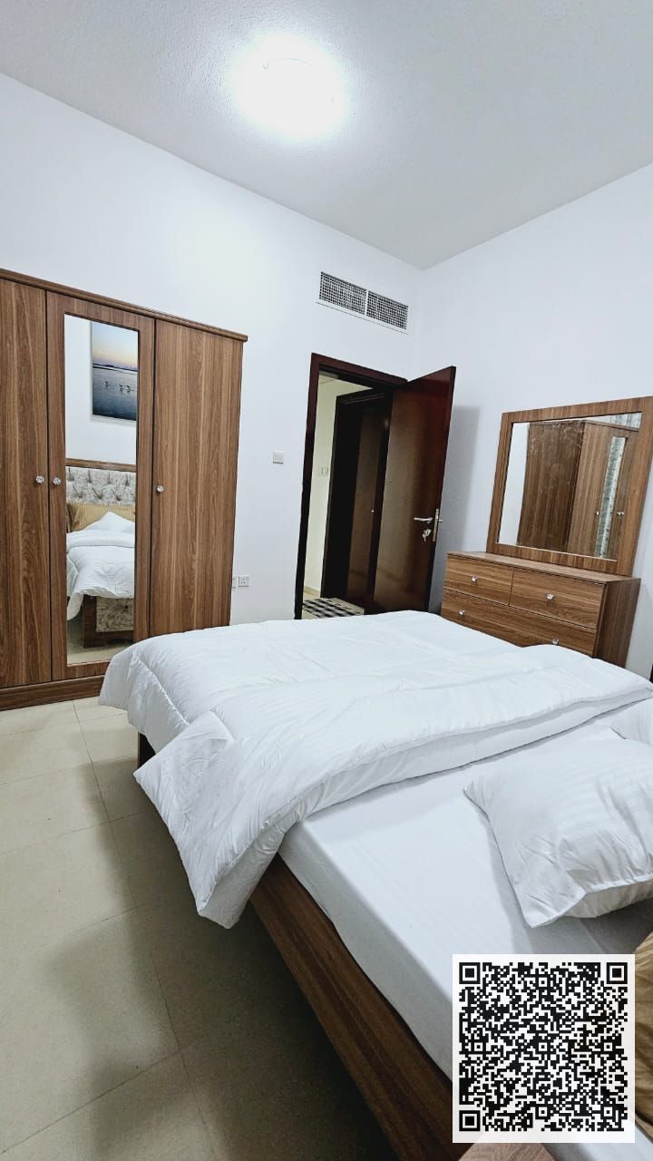**Investment Opportunity – Fully Furnished 2BR Apartment in City Tower | Grand Mall View | Monthly Installment AED 4,700**