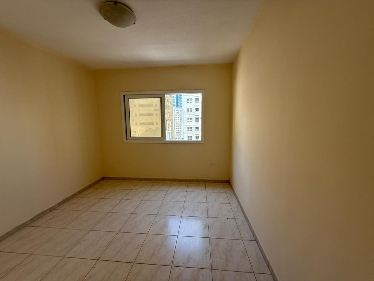2BR & living in Al Qasimia | Spacious | Family building | Free maintenance | Flexible payments | Prime location close to all services