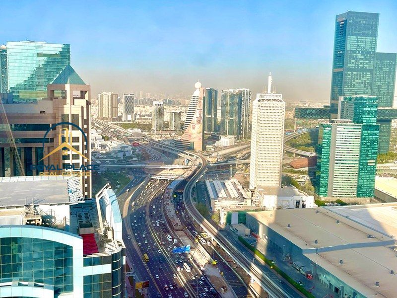 High-Rise Unfurnished 2BR | Open SZR Views | Steps from Metro | Prime City Living