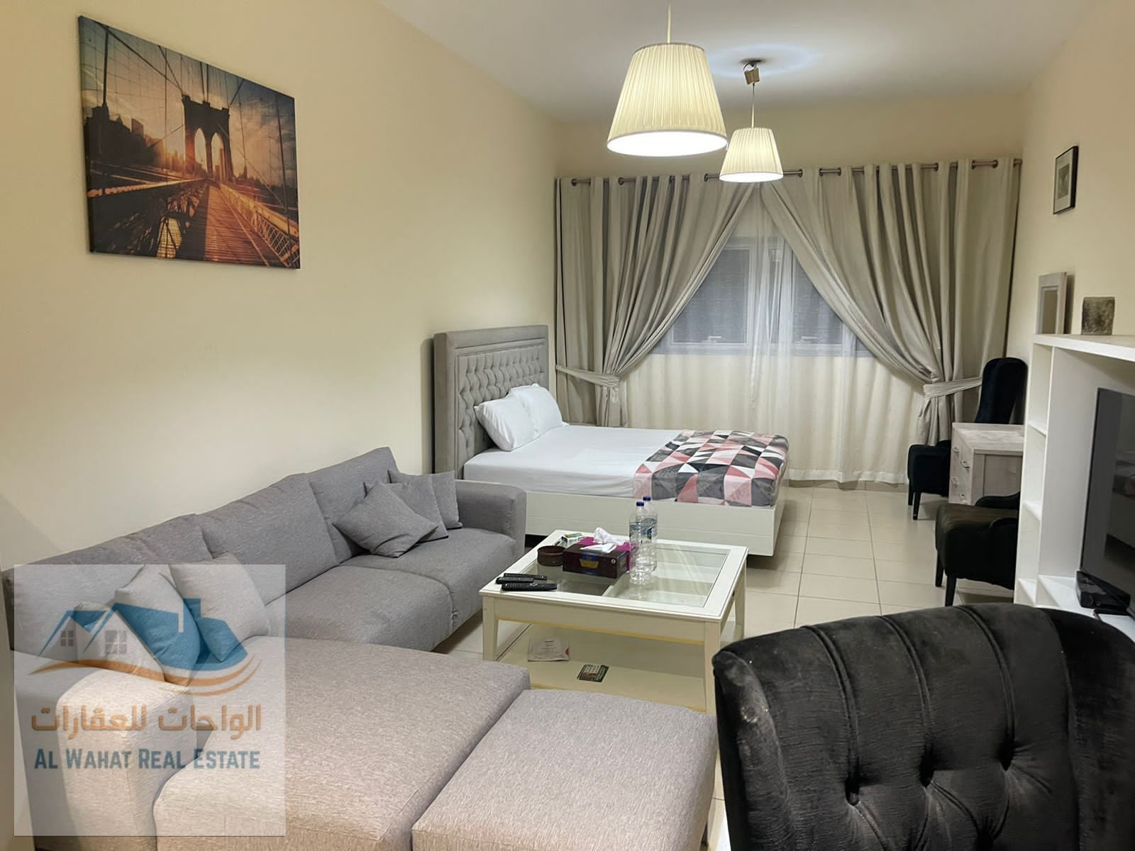 Upscale studio apartment with an open view and a fully furnished semi-detached kitchen. The apartment features high-end furnishings, a fully equipped