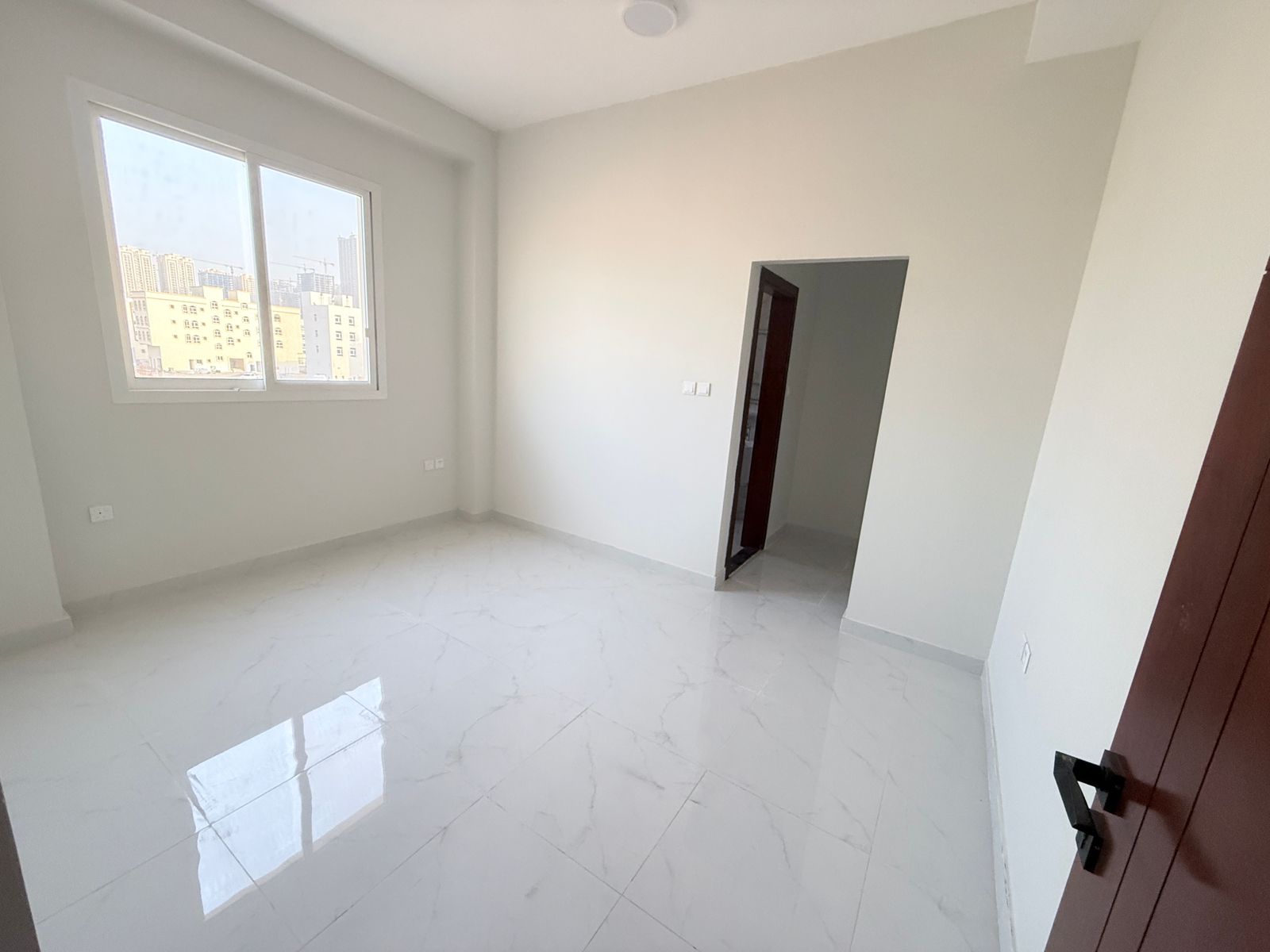 Brand New Apartment for Rent in Al Alia, Ajman – Spacious and Elegant Design – Central Air Conditioning and Balcony