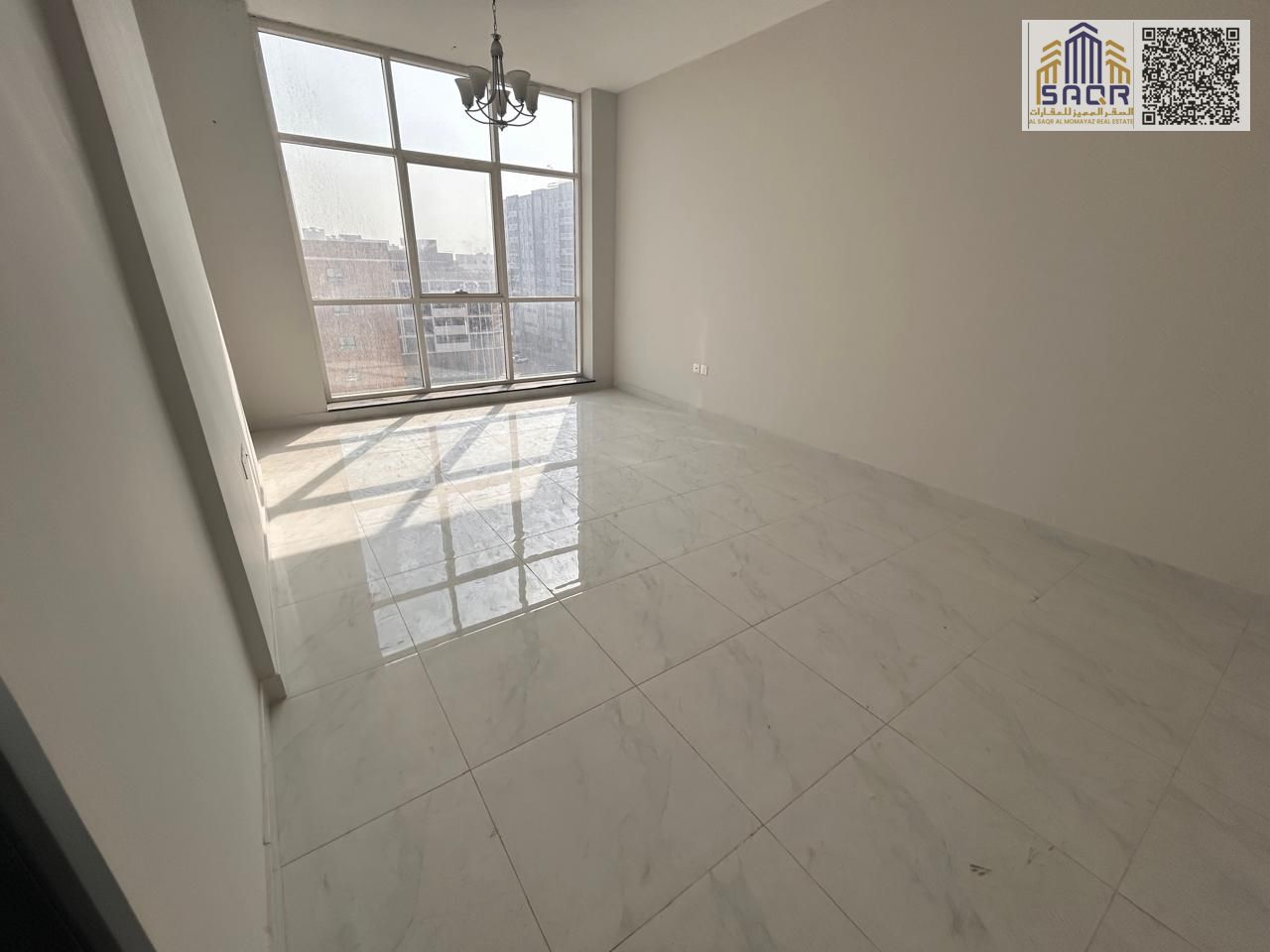 Two Bedroom Apartment With Balcony And Central AC In Al Jurf 3