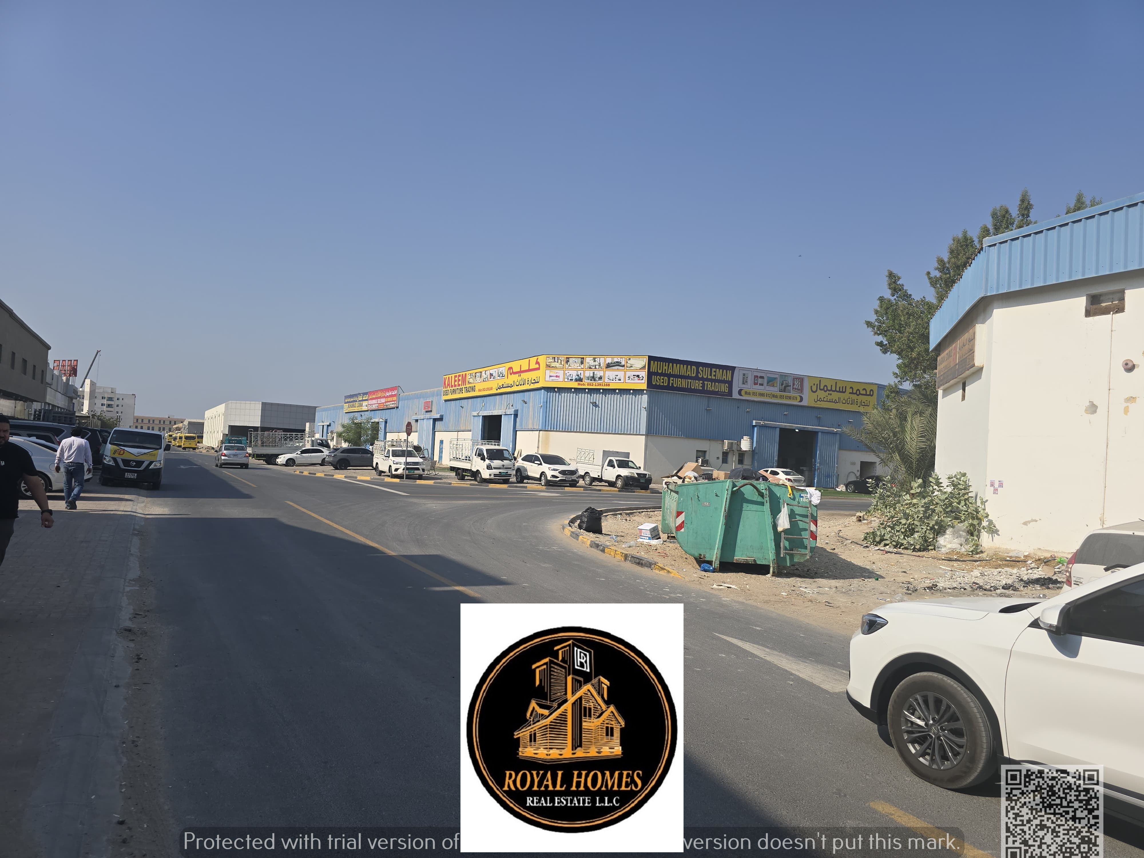 For sale: 44,000 sq ft plot with 4 warehouses and workers' accommodation. Freehold, open to all nationalities