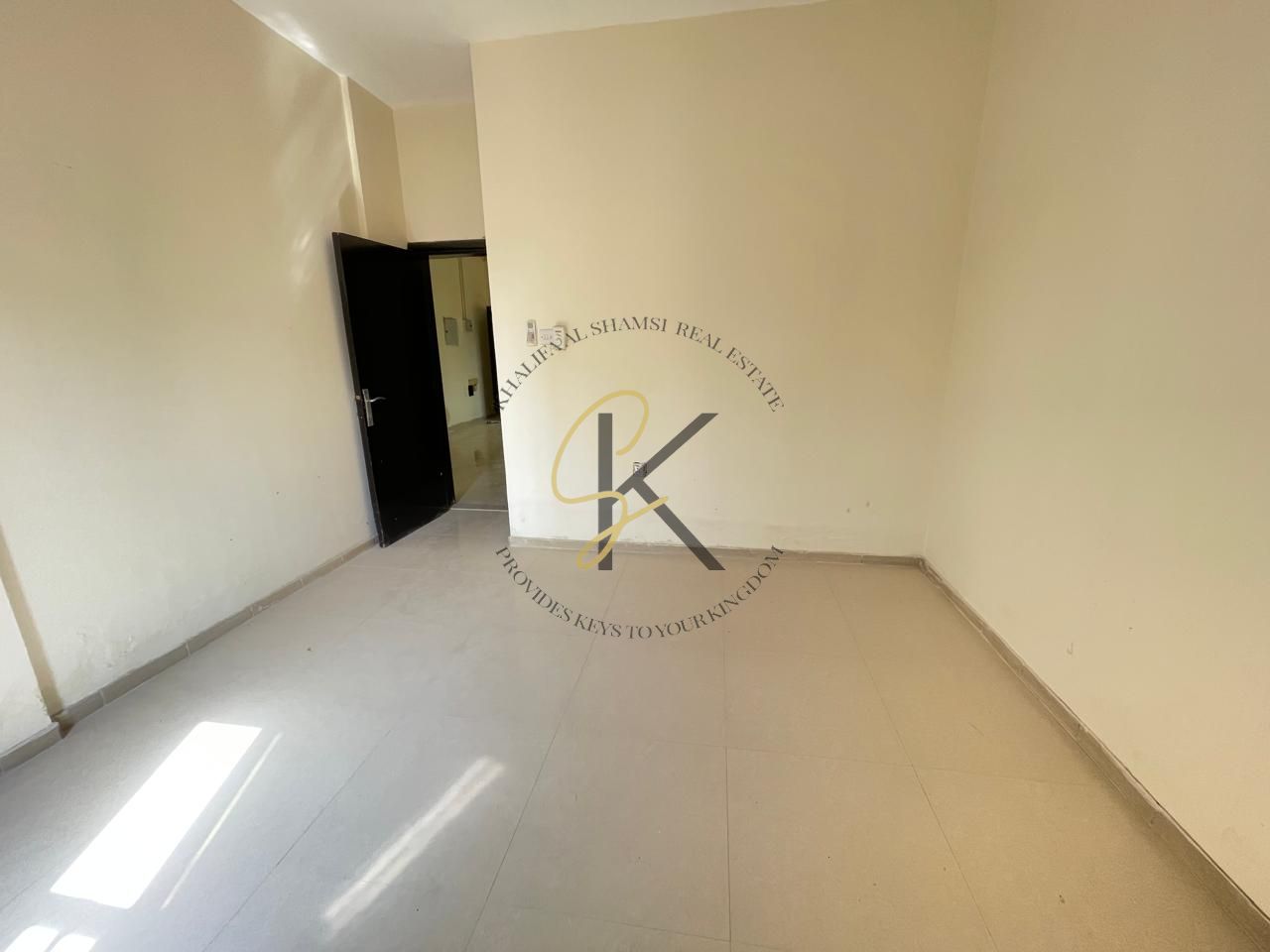 Spacious Unfurnished 2 BHK with Balcony for Bachelor Rent in Muwailah, Sharjah | 1350 Sqft | Prime Location | Full Amenities