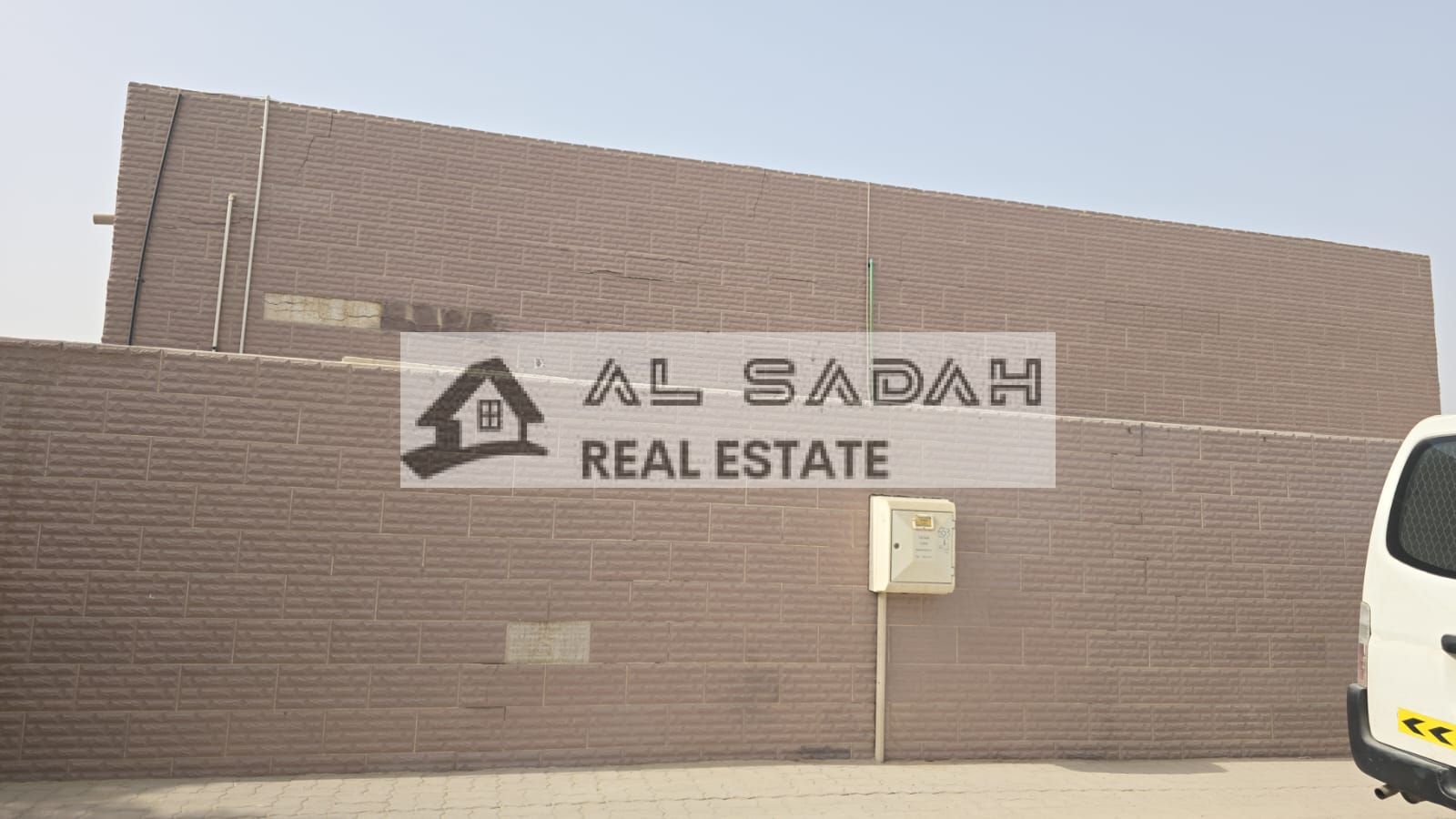 For sale: A corner house in Umm Khanoor, divided into two sections. The first section has 4 bedrooms, a living room, a majlis (formal sitting room), and a kitchen. The second section has 3 bedrooms, a living room, a kitchen, and a majlis. Currently rented