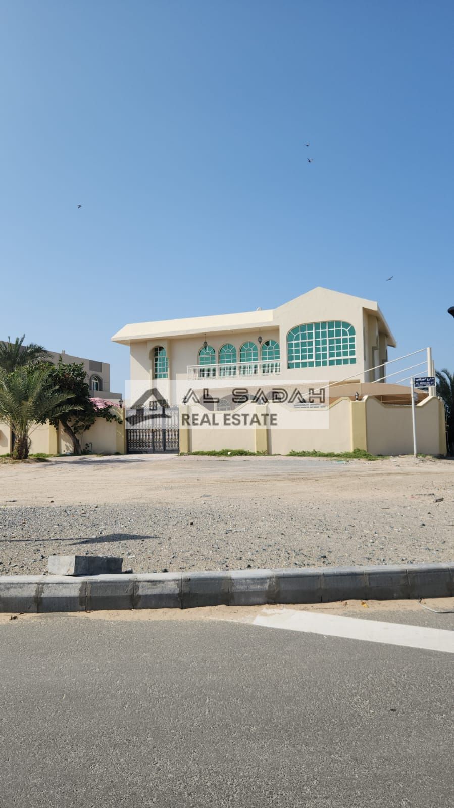 For sale: A two-story corner villa in the Al Nakheelat area, consisting of: The upper floor has three large master bedrooms and a living room. The ground floor has a master bedroom, a living room, a majlis (formal sitting room), and an internal kitchen. A