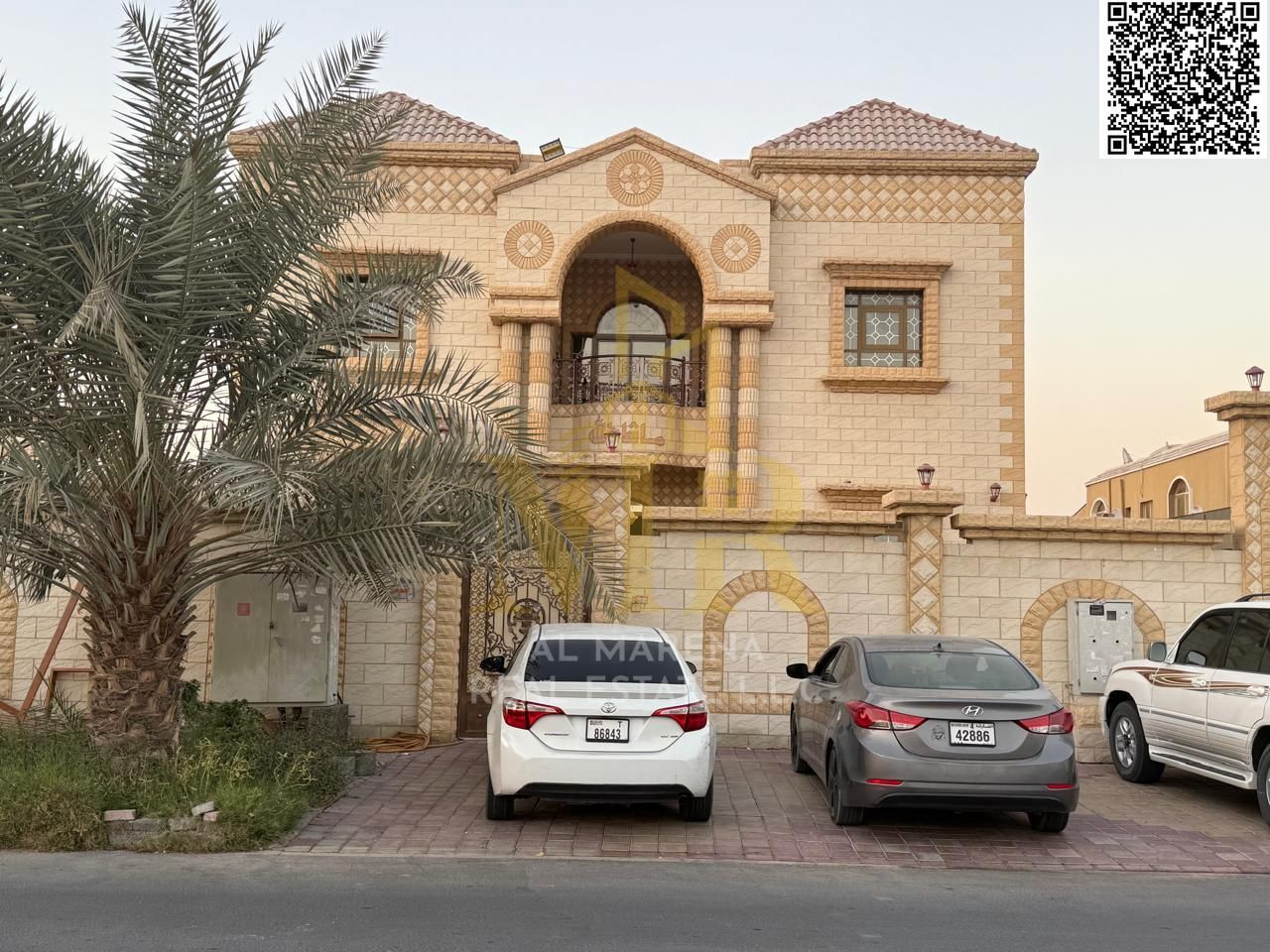 Luxury villa in Al Rawda 3 area, 9000 sq ft, residential/commercial, close to Sheikh Ammar Street and Shurooq Mall, includes electricity, water and ai