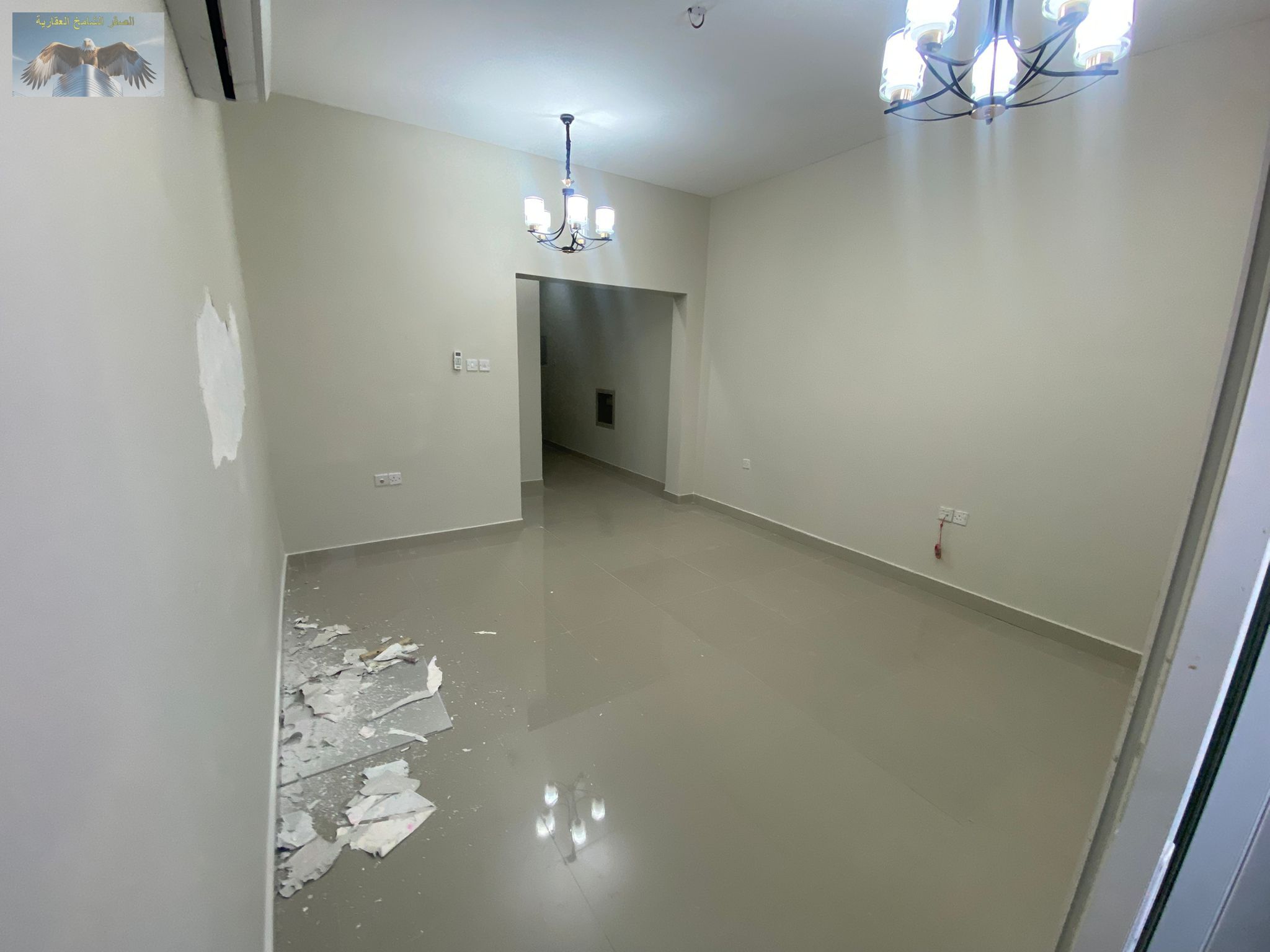 For annual rent in Ajman, Al Jurf 2: A one-bedroom apartment with a living room, located in a prime location next to the National School