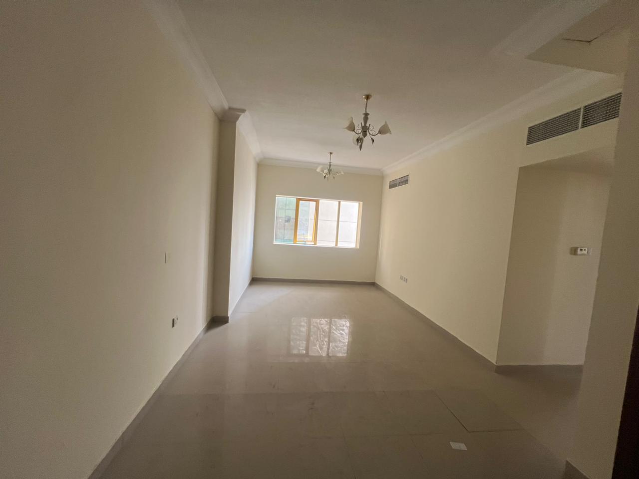 Central air conditioning | Flexible payment – The most beautiful and luxurious 2-bedroom apartment with a living room in Al Taawun near Dubai exit.