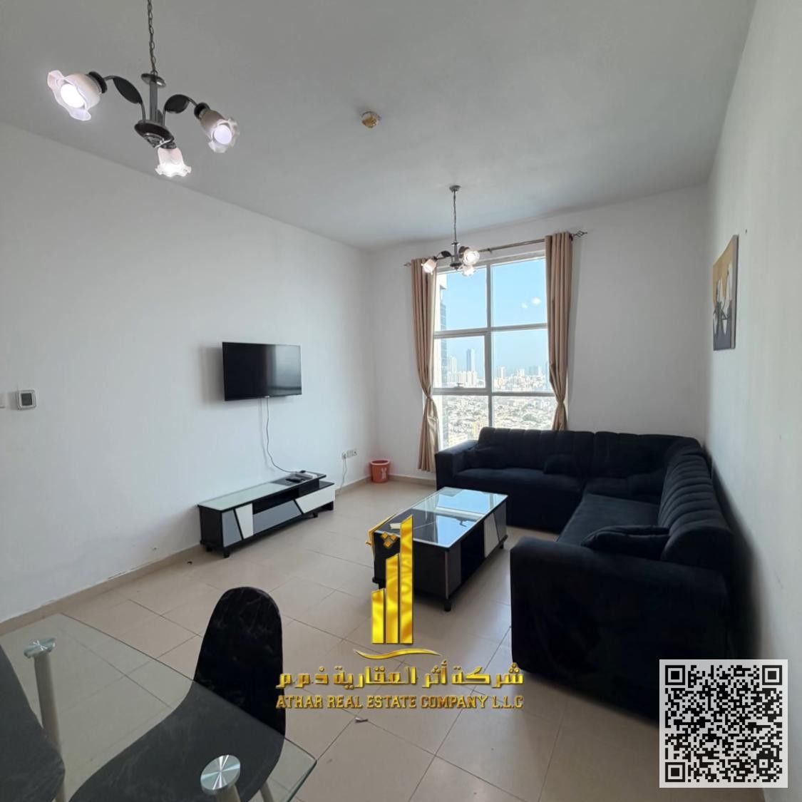 With an open view, a furnished two-bedroom apartment with a living room is available for monthly rent in Ajman Includes bills, internet, parking.