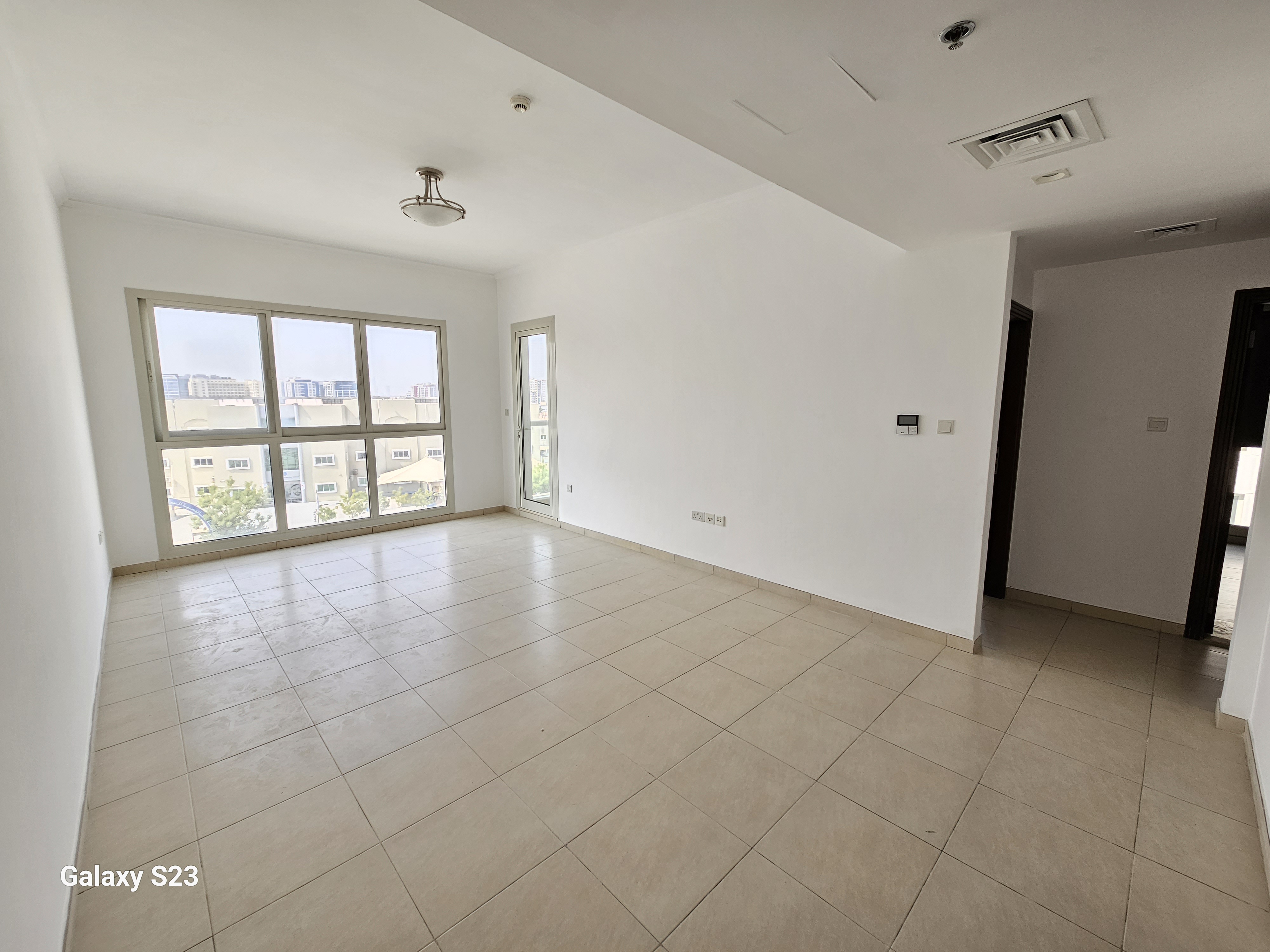 LIKE A NEW 1BHK APARTMENT NEAR TO EXIT WITH GYM POOL AND COVERED PARKING.