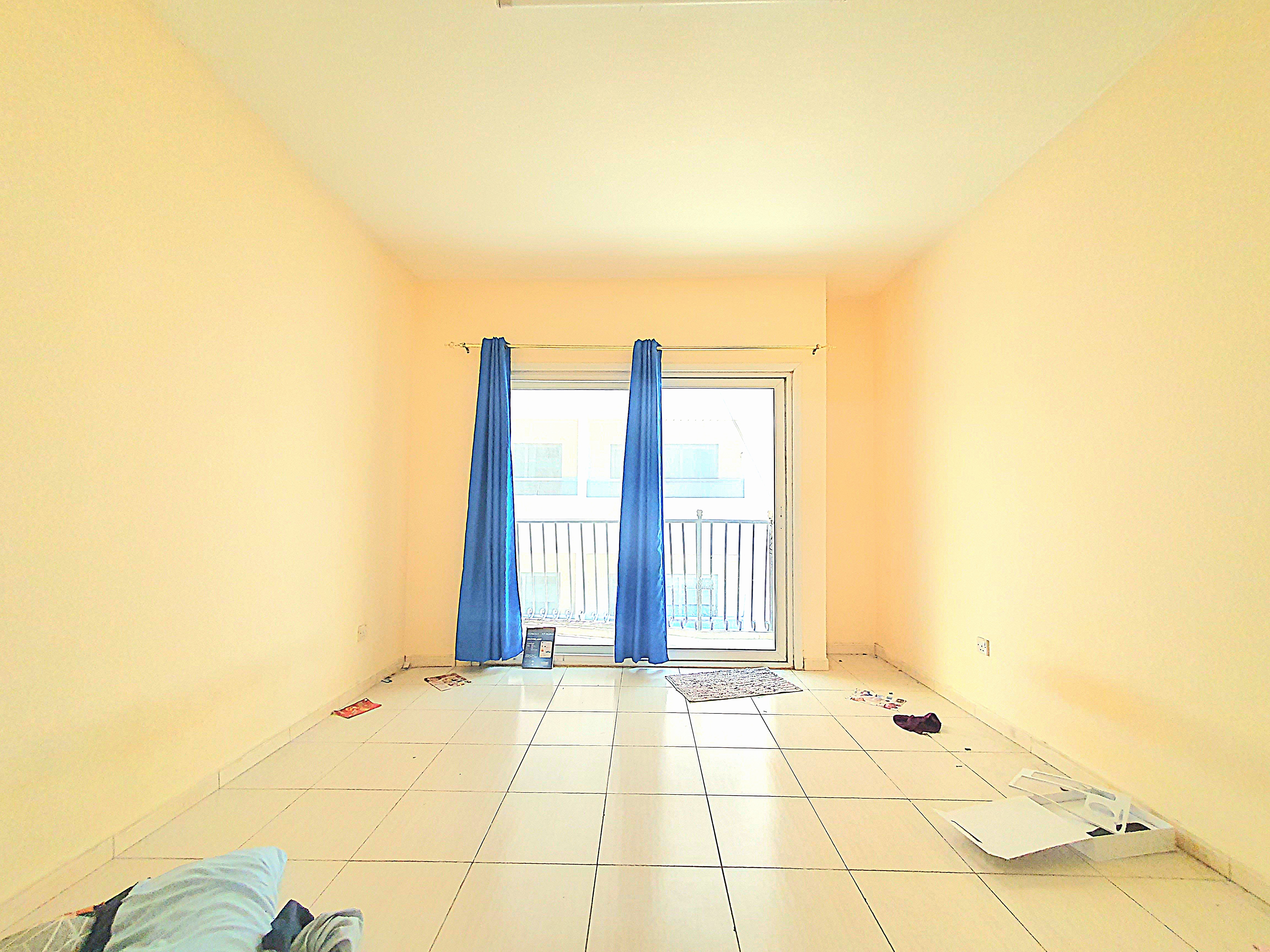 DOUBLE STUDIO WITH BALCONY ON ROAD BUILDING IN MUWAILEH