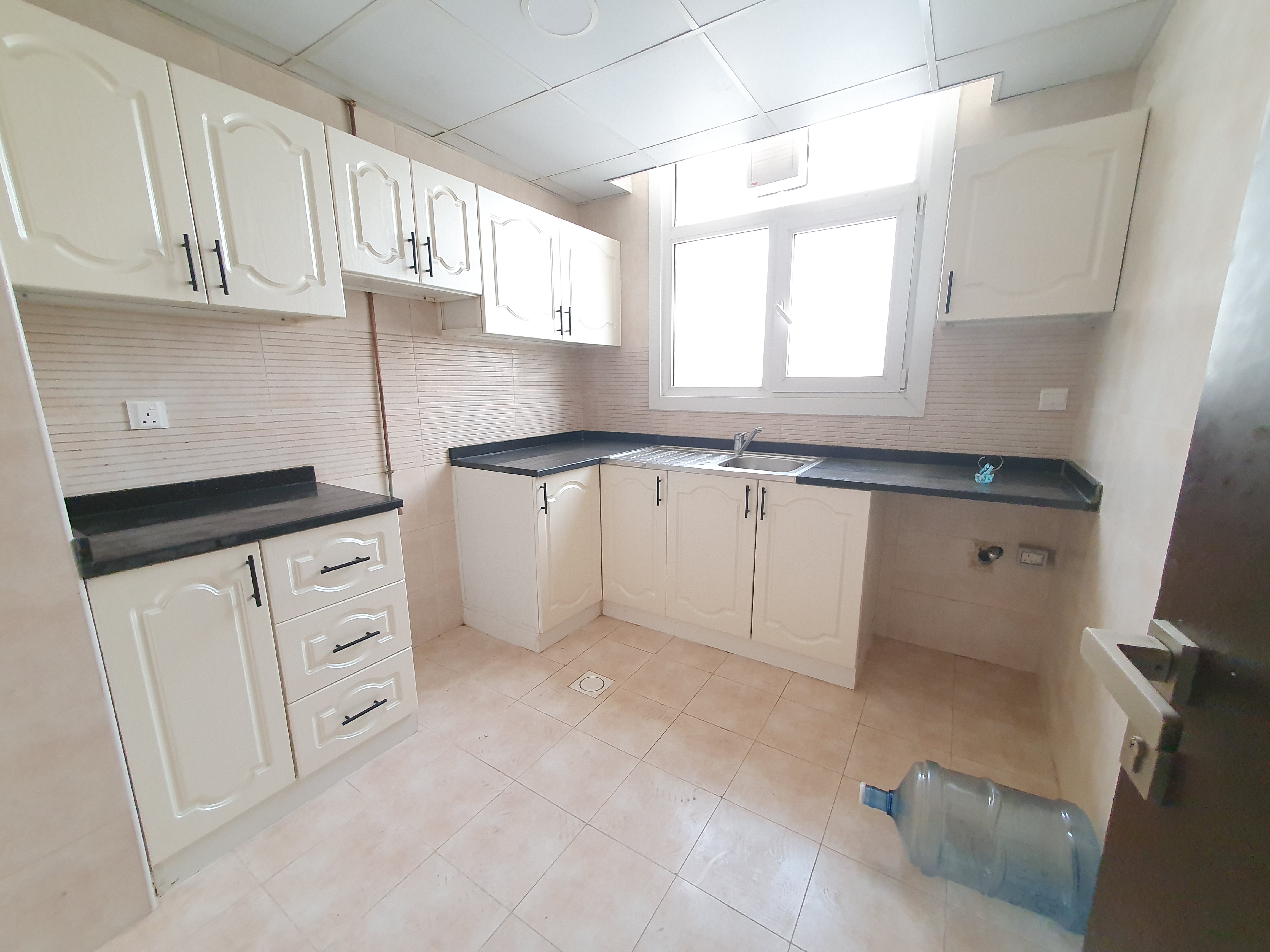 NO DEPOSIT CASH 1BHK LIKE BRAND NEW BUILDING IN MUWAILEH