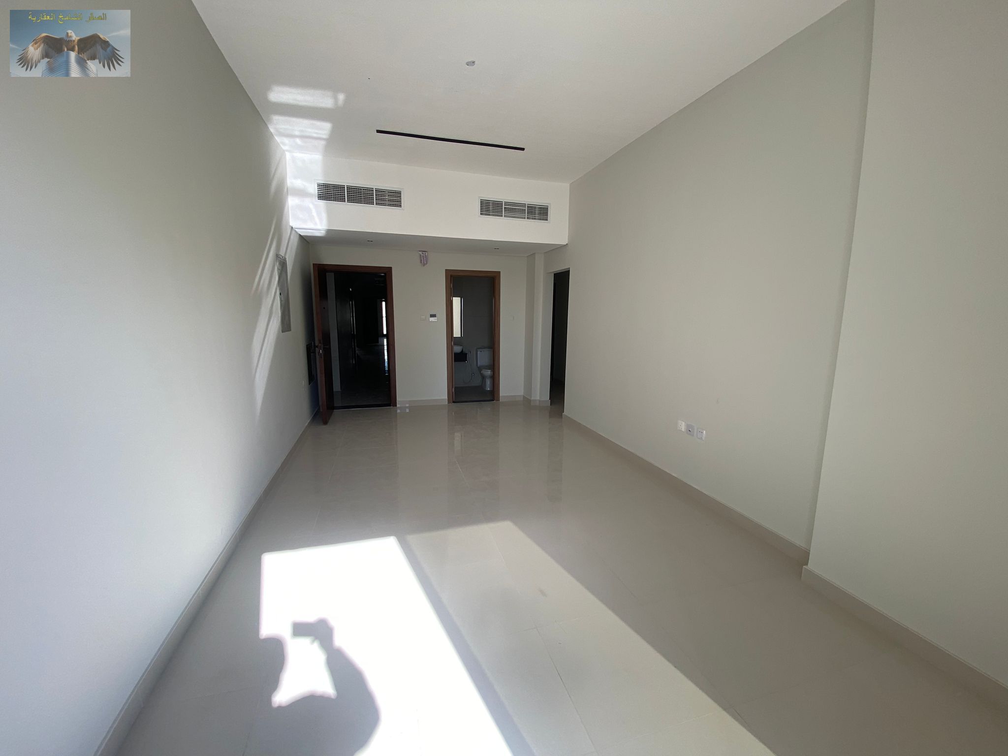 An apartment featuring a modern design and high-quality finishing, consisting of three bedrooms and a spacious living hall, with central air condition