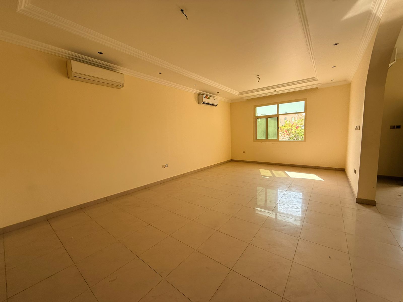 Luxury 4BR villa with master room, laundry & store rooms, built-in wardrobes, indoor & outdoor parking, and a spacious yard.