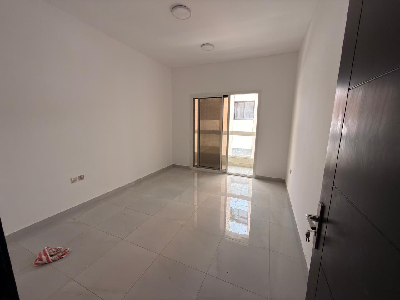 Spacious 1 Bedroom Apartment with Living Hall for Annual Rent in Al Jurf 3 Ajman New Building Balcony Open View Master Room Central AC Full Maintenanc