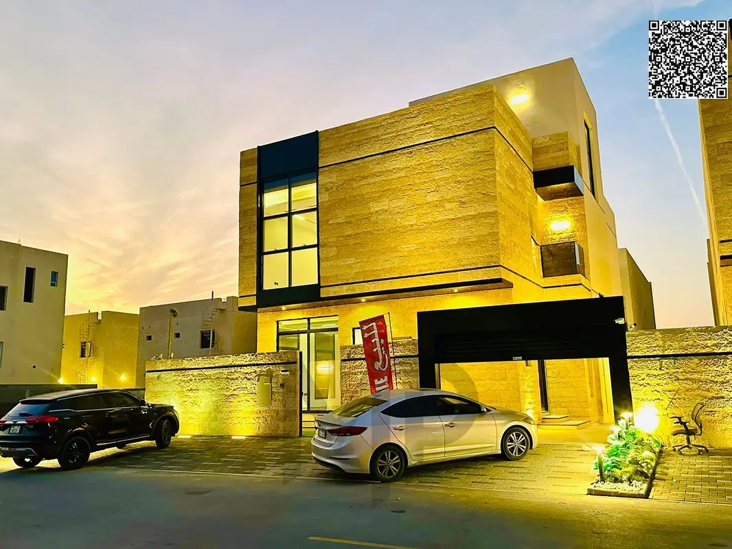 A European-style villa with a modern design in Al Bahia, at a price that includes registration and ownership fees, available with bank financing or ca