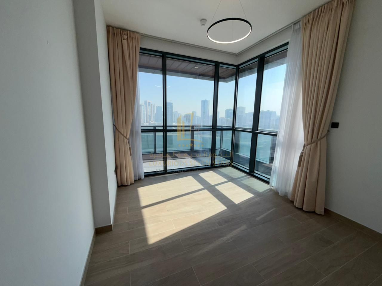 For Sale 2-Bedroom Apartment with Front Sea View in Al Mamar