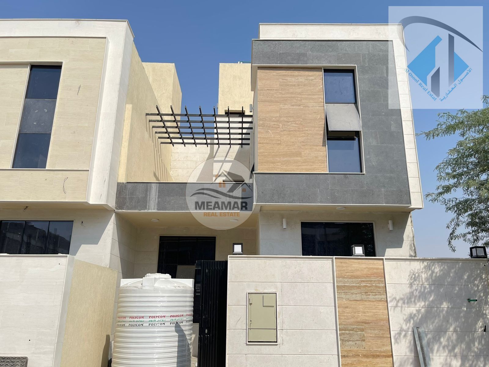 New villa, all fees included, in a prime location in Ajman, freehold ownership, close to amenities