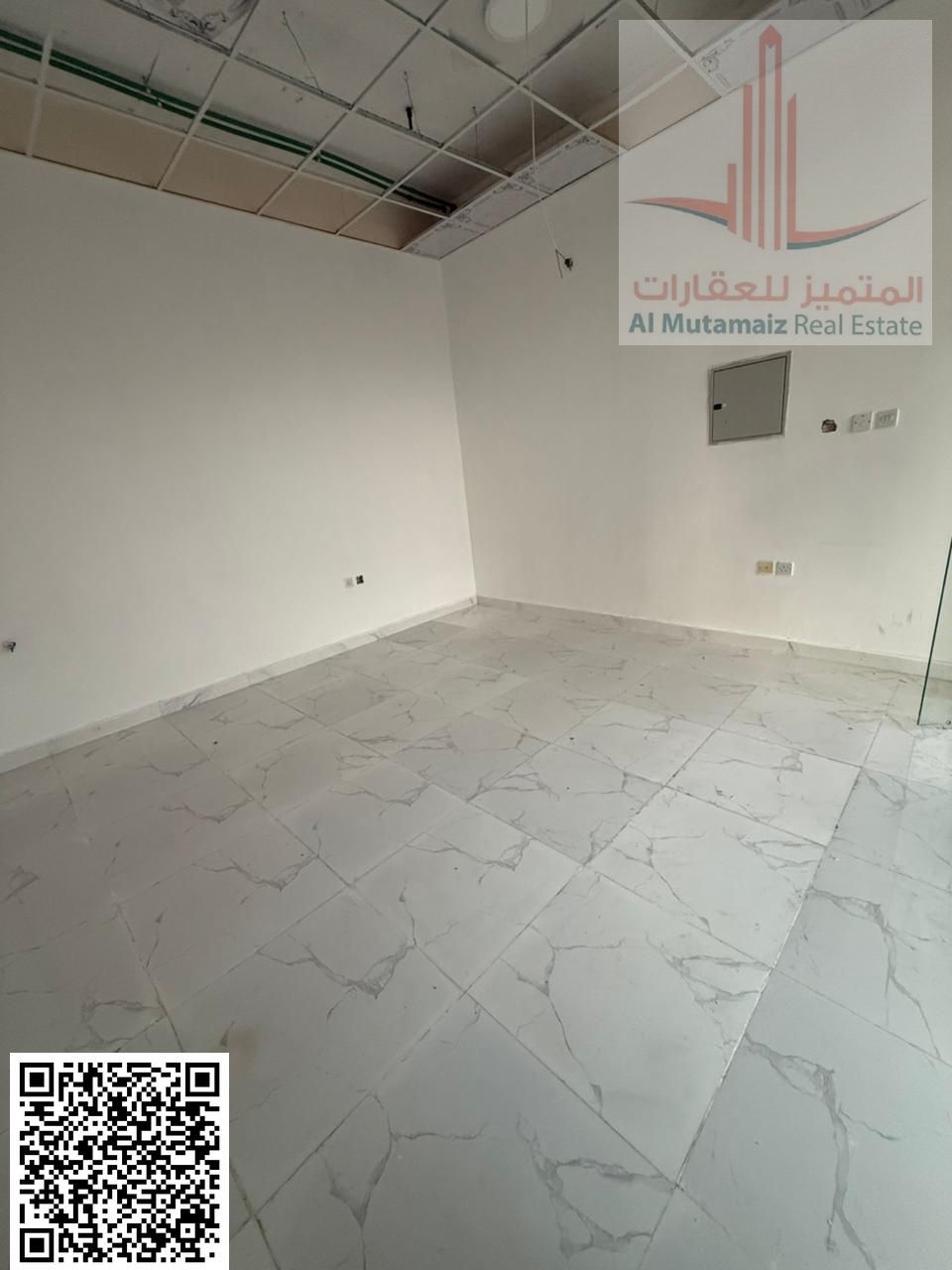 For sale in Ajman, a commercial building on Al Helio Street, with a building area of 120 square meters. Asking price: AED 1,350,000 including fees.